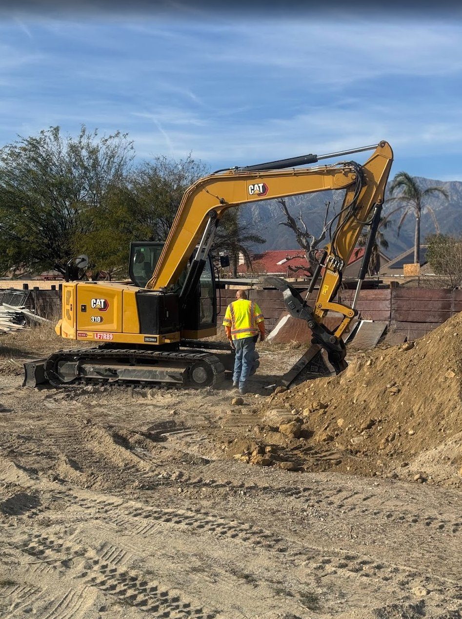 CAT excavator on a new-build site in the Inland Empire