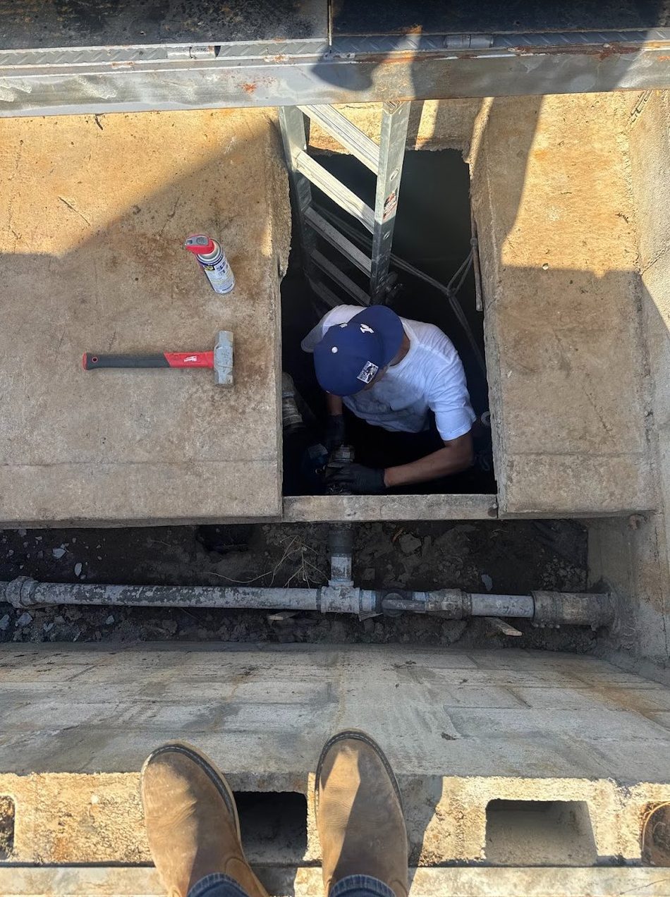 Installing pump piping inside a concrete vault