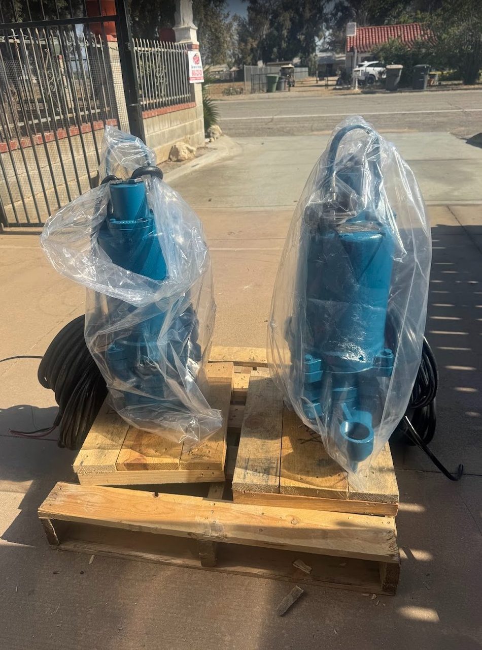 New submersible pumps staged for a commercial install